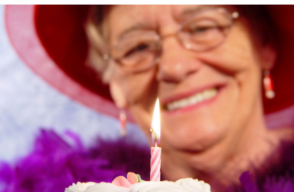 Resident with birthday cake